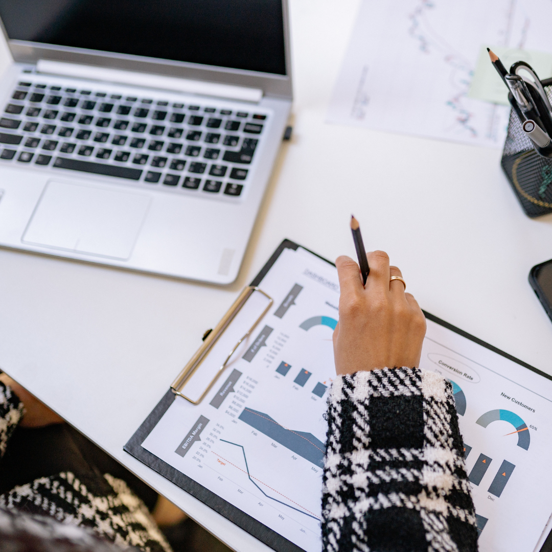 Business analyst reviewing reports and performance metrics during a NetSuite audit assessment